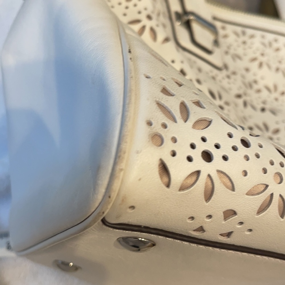 Coach Taylor Perforated Putty White Leather Satchel
12"L x 4.5"W x 8"H - Picture 8 of 11